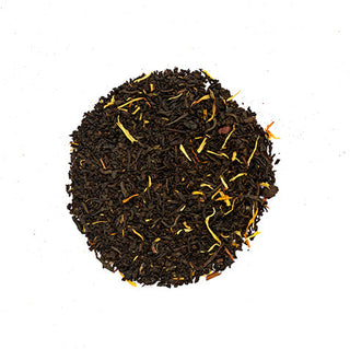 Loose leaf black tea on a white background